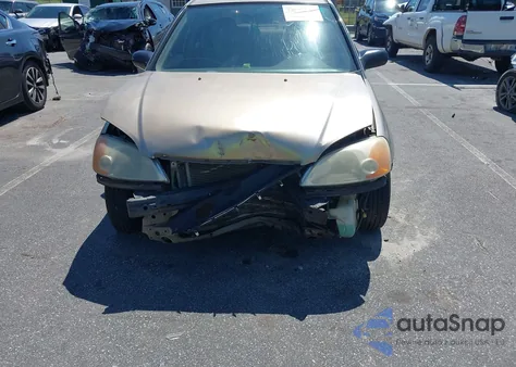 2001 Honda Civic Lx z USA, uszkodzony, nr VIN 1HGES16571L028730